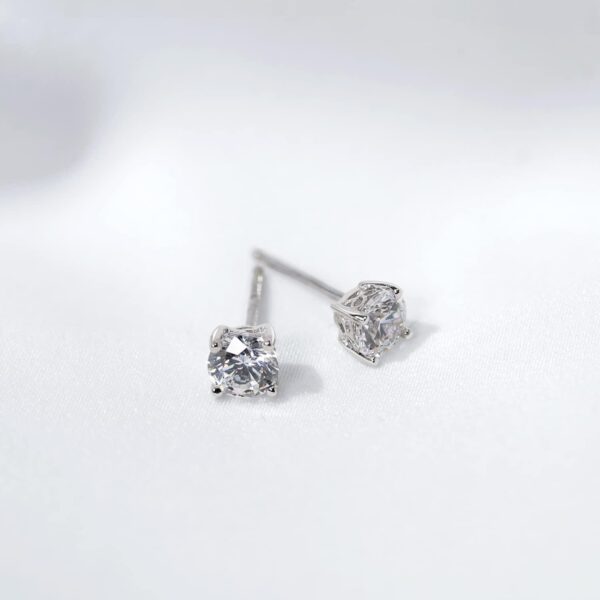 Amazon Essentials Yellow Gold Plated, Platinum or Rose Gold Plated Sterling Silver Infinite Elements Cubic Zirconia Stud Earrings | White, Blue, Green, or Pink Cubic Zirconia (previously Amazon Collection) - Image 3